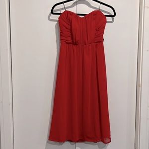 Strapless red mid length dress